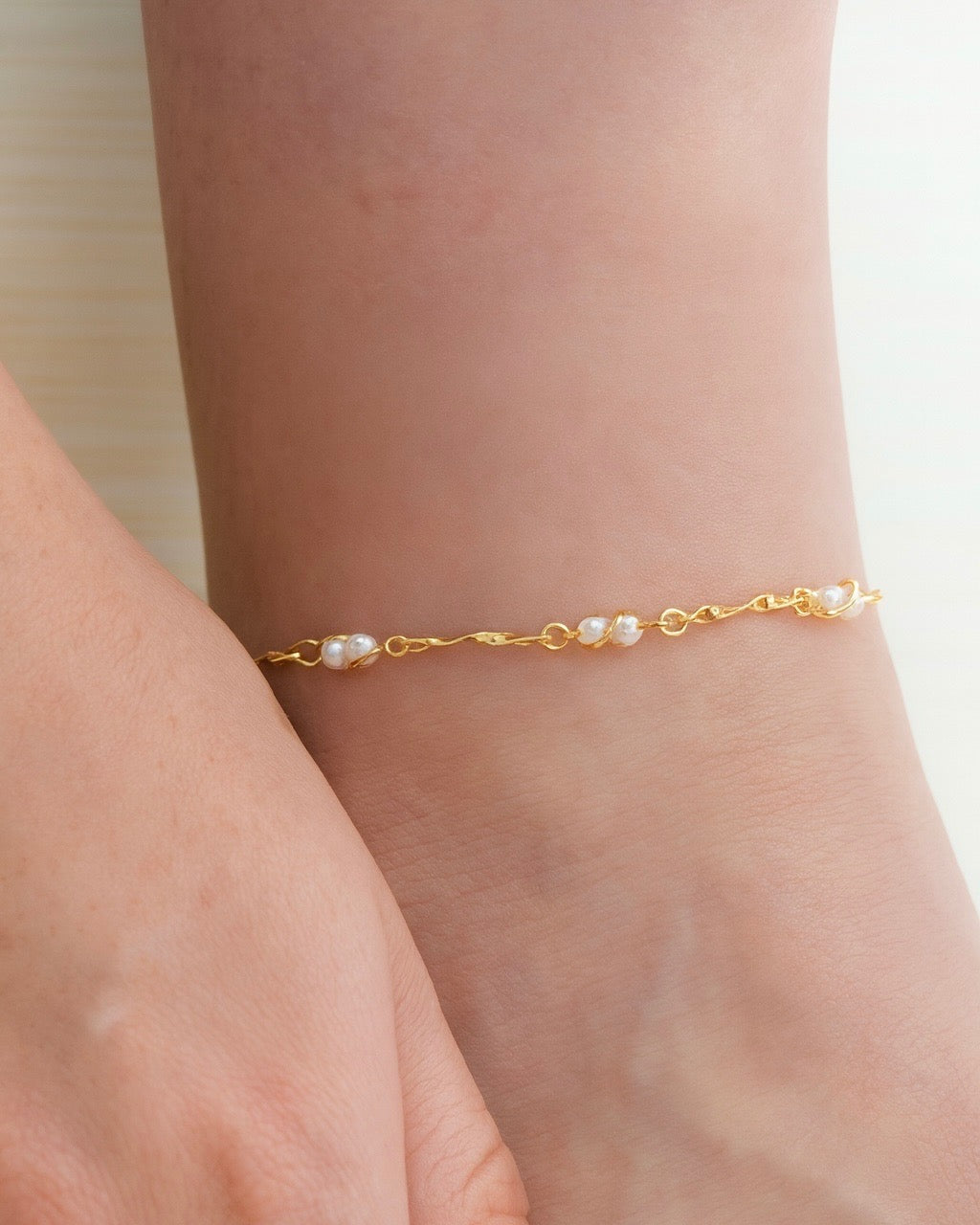 Tobillera perla 23cms ext